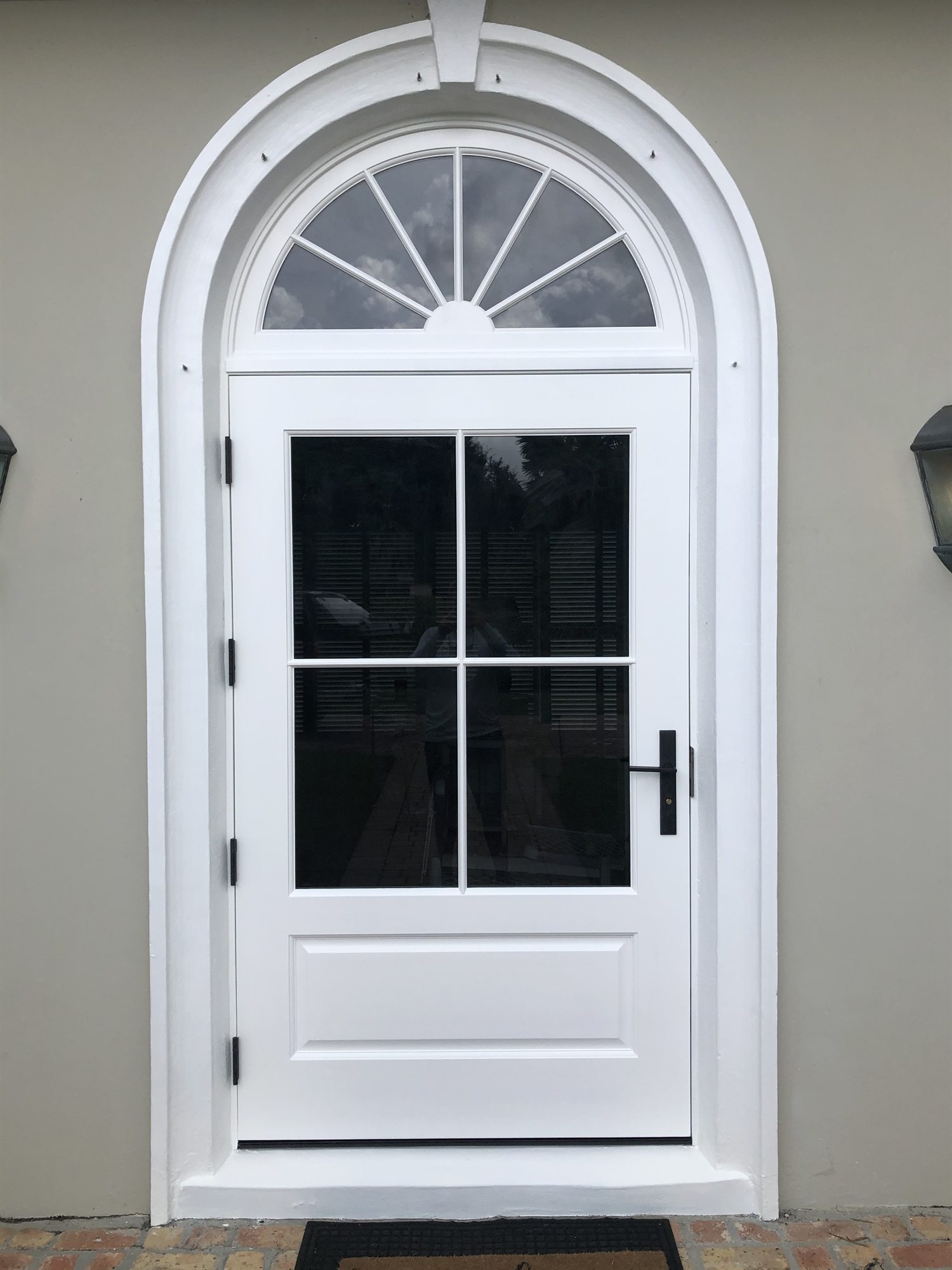 Arched entry door and transom, repainted