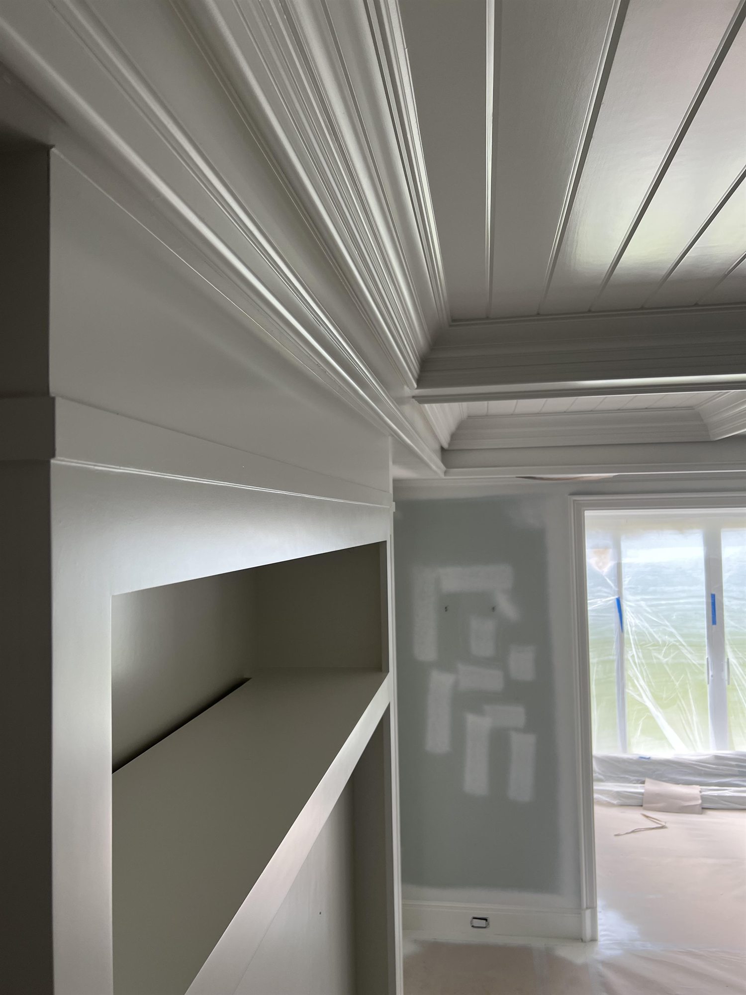 Crown molding and built-in niche, brush-finished
